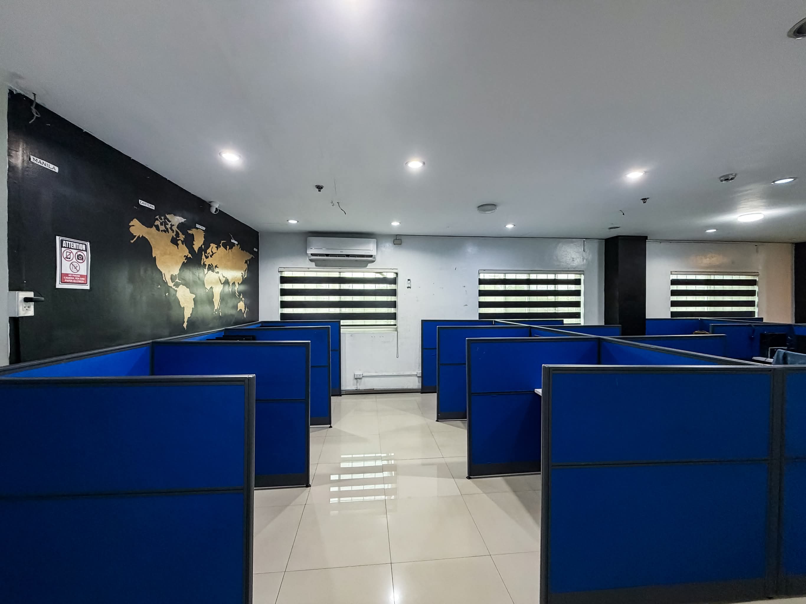 Wenovate BPO production floor with multiple workstations